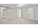 Neutral bedroom boasts a walk-in shower, closet space, and neutral paint at 10482 W 75Th Ave, Arvada, CO 80005