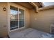 Small back patio with sliding glass doors at 8588 W Quarles Pl, Littleton, CO 80128