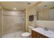 Basement bathroom with shower and updated vanity at 8588 W Quarles Pl, Littleton, CO 80128