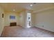 Finished basement bedroom with neutral carpeting and ample space at 8588 W Quarles Pl, Littleton, CO 80128