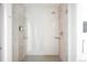 Stylish bathroom showcases a glass-enclosed shower, sleek fixtures, and modern design at 2880 Zuni St # 406, Denver, CO 80211