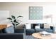 Comfortable living room showcasing plush seating, stylish decor, and warm ambiance at 2880 Zuni St # 406, Denver, CO 80211