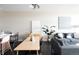 Open living space, with modern furniture, décor, and plenty of natural light, perfect for relaxation and entertaining at 2880 Zuni St # 406, Denver, CO 80211