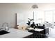 Inviting living room and dining area with neutral paint colors, modern furnishings and plenty of natural light at 2880 Zuni St # 406, Denver, CO 80211