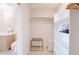 Bright walk-in closet features built in shelving, luggage rack and is adjacent to the primary bath at 2880 Zuni St # 406, Denver, CO 80211