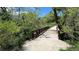 Take a stroll on the bridge surrounded by lush greenery near the neighborhood at 7923 S Marion Ct, Centennial, CO 80122