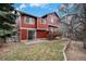 Exterior elevation with expansive backyard featuring a grass lawn at 13339 E Idaho Pl, Aurora, CO 80012
