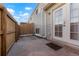 Private back patio with newer fence and outdoor living space at 5711 W 92Nd Ave # 30, Westminster, CO 80031