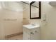 Well-maintained bathroom with a shower, vanity sink, and neutral tile accents at 5711 W 92Nd Ave # 30, Westminster, CO 80031