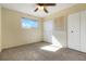 Inviting bedroom with a ceiling fan, natural light, and ample closet space at 5711 W 92Nd Ave # 30, Westminster, CO 80031