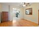 Sun-filled dining area showcases hardwood floors, traditional cabinet and open access to the kitchen at 5711 W 92Nd Ave # 30, Westminster, CO 80031