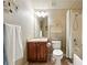 Cozy bathroom featuring a vanity, a shower-tub combination and decorative shelving unit at 4944 W 107Th Loop, Westminster, CO 80031