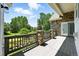 Well-designed deck featuring stone pillars, wood railings, and ample space for outdoor enjoyment at 4944 W 107Th Loop, Westminster, CO 80031
