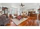 Open concept living room with hardwood floors, comfortable seating, and an inviting atmosphere for relaxation and entertainment at 4944 W 107Th Loop, Westminster, CO 80031