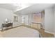 A bedroom with carpet, a decorative tapestry on the wall, and a vanity table is shown in the photo at 444 Pasada Way, Monument, CO 80132