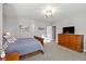 Spacious bedroom with natural light, soft carpeting, and a beautiful view at 444 Pasada Way, Monument, CO 80132