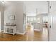 The entryway boasts gorgeous hardwood floors leading to a bright, open living space at 444 Pasada Way, Monument, CO 80132