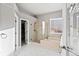 Elegant bathroom featuring a glass-enclosed shower and soaking tub, creating a spa-like retreat at 444 Pasada Way, Monument, CO 80132