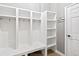 Organized mudroom with built-in shelving and storage space, perfect for keeping things tidy at 444 Pasada Way, Monument, CO 80132