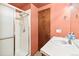 Bathroom featuring a vanity and shower with glass doors at 1950 S Helena St # D, Aurora, CO 80013