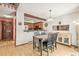 Inviting dining area adjacent to the kitchen, featuring hardwood floors and a stylish table set at 1950 S Helena St # D, Aurora, CO 80013