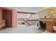 Loft area with skylights, hardwood floors, and view of the living area below at 1950 S Helena St # D, Aurora, CO 80013