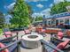 Backyard fire pit surrounded by comfortable Adirondack chairs, creating a cozy outdoor space at 5350 Yellowstone St, Bow Mar, CO 80123