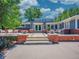Inviting patio with outdoor seating and a beautifully landscaped entrance at 5350 Yellowstone St, Bow Mar, CO 80123