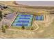 Aerial shot of tennis and pickle ball courts, a great community amenity near the lake at 5350 Yellowstone St, Bow Mar, CO 80123