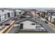 Aerial view of modern townhomes with rooftop decks, showcasing urban living and community layout at 8742 E 47Th Ave, Denver, CO 80238