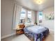 Cozy bedroom with ample natural light and stylish furnishings, perfect for relaxation at 8742 E 47Th Ave, Denver, CO 80238