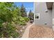 Well-maintained landscaping surrounds the home, creating a peaceful outdoor space at 6643 Orion Ct, Arvada, CO 80007