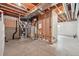 Unfinished basement with exposed utilities and potential for customization offers a blank canvas for your dream space at 11896 Meade Ct, Westminster, CO 80031