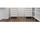 Walk-in closet features modern shelving and drawer units for optimal storage and organization at 11896 Meade Ct, Westminster, CO 80031