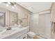 Basement bathroom with a shower and white vanity at 16038 E Oxford Dr, Aurora, CO 80013