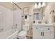 Clean bathroom with a tub, sink, and vanity at 16038 E Oxford Dr, Aurora, CO 80013