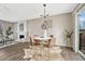 Charming dining area with a round table and four chairs at 16038 E Oxford Dr, Aurora, CO 80013