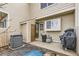 Backyard featuring outdoor seating, grill, and brick pavers, perfect for outdoor entertaining at 1192 S Zeno Way # E, Aurora, CO 80017