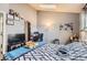 Cozy bedroom with a skylight, plush carpet, and plenty of natural light, creating a relaxing space at 1192 S Zeno Way # E, Aurora, CO 80017