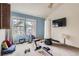 Bonus room with carpeted floors, natural light, and an accent wall, making it the perfect workout space at 1192 S Zeno Way # E, Aurora, CO 80017
