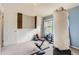 Bonus room with carpeted floors, natural light, and an accent wall, making it the perfect workout space at 1192 S Zeno Way # E, Aurora, CO 80017