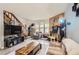 Bright living room with hardwood floors and a fireplace feature at 1192 S Zeno Way # E, Aurora, CO 80017