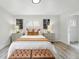 Cozy bedroom features decorative nightstands, modern accent pieces, and a comfortable bed at 3342 S Flamingo Way, Denver, CO 80222