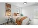 Inviting bedroom with earth-tone accents, stylish decor, and ample natural light creates a warm and restful atmosphere at 3342 S Flamingo Way, Denver, CO 80222