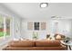 Inviting living room featuring stylish decor and plenty of natural light at 3342 S Flamingo Way, Denver, CO 80222