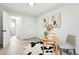 Bright office featuring a modern desk, decor, and access to the bathroom at 3342 S Flamingo Way, Denver, CO 80222