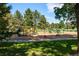 A vibrant playground with various play structures, set in a park-like environment at 3342 S Flamingo Way, Denver, CO 80222
