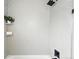 Updated tiled shower featuring a rainfall shower head and wall niche at 3342 S Flamingo Way, Denver, CO 80222