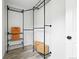 Walk-in closet features sleek black metal shelving and ample storage space for clothes, shoes, and accessories at 3342 S Flamingo Way, Denver, CO 80222