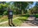 A well-maintained walking trail surrounded by mature trees and landscaping at 3342 S Flamingo Way, Denver, CO 80222